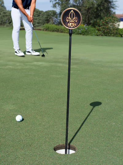 putting stick with case bronze logo medallion
