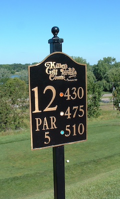 cast bronze tee sign