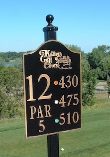 bronze tee sign