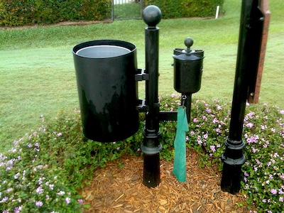 ball washer with trash can on a post