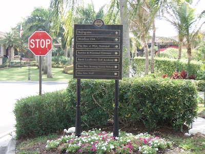 Carved black granite directional sign