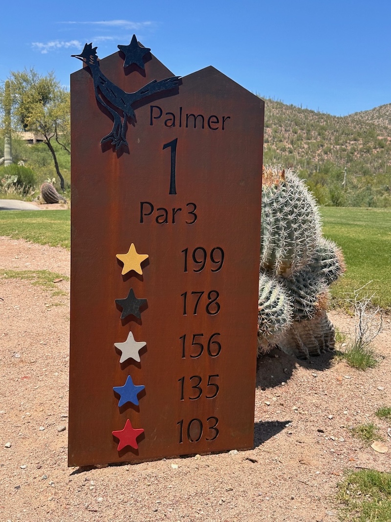 steel tee sign on desert golf course